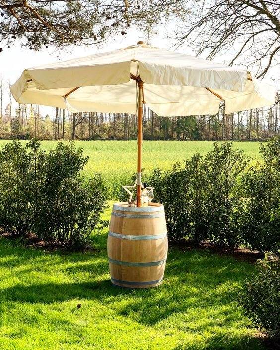 30 Creative Ways To Upcycle Whiskey Barrels For Home and Garden