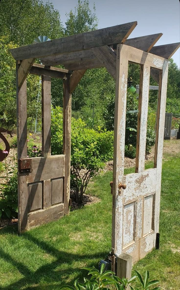 20 Creative DIY Backyard Door Ideas That Open into the Green Woods Weathered Double Door Arbor