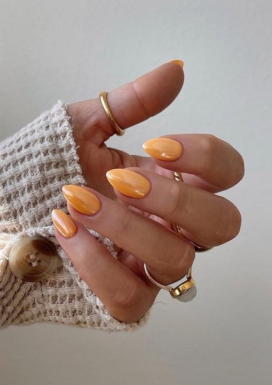 Light orange chrome nails