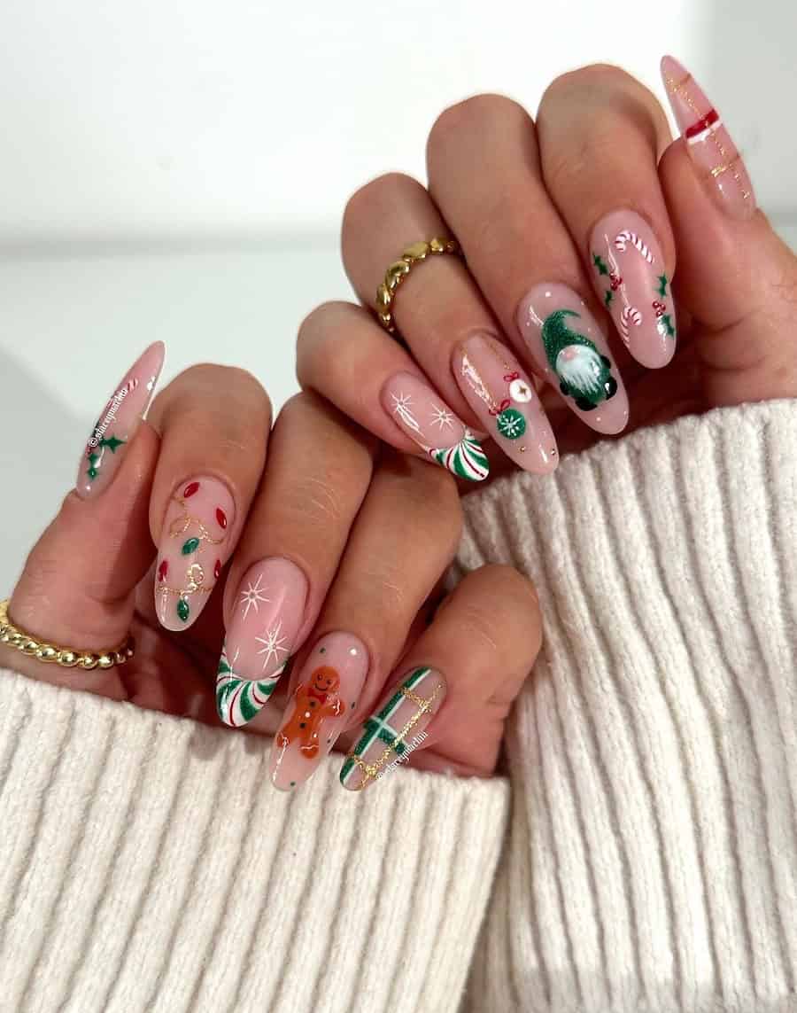 long nude nails with collage style christmas art