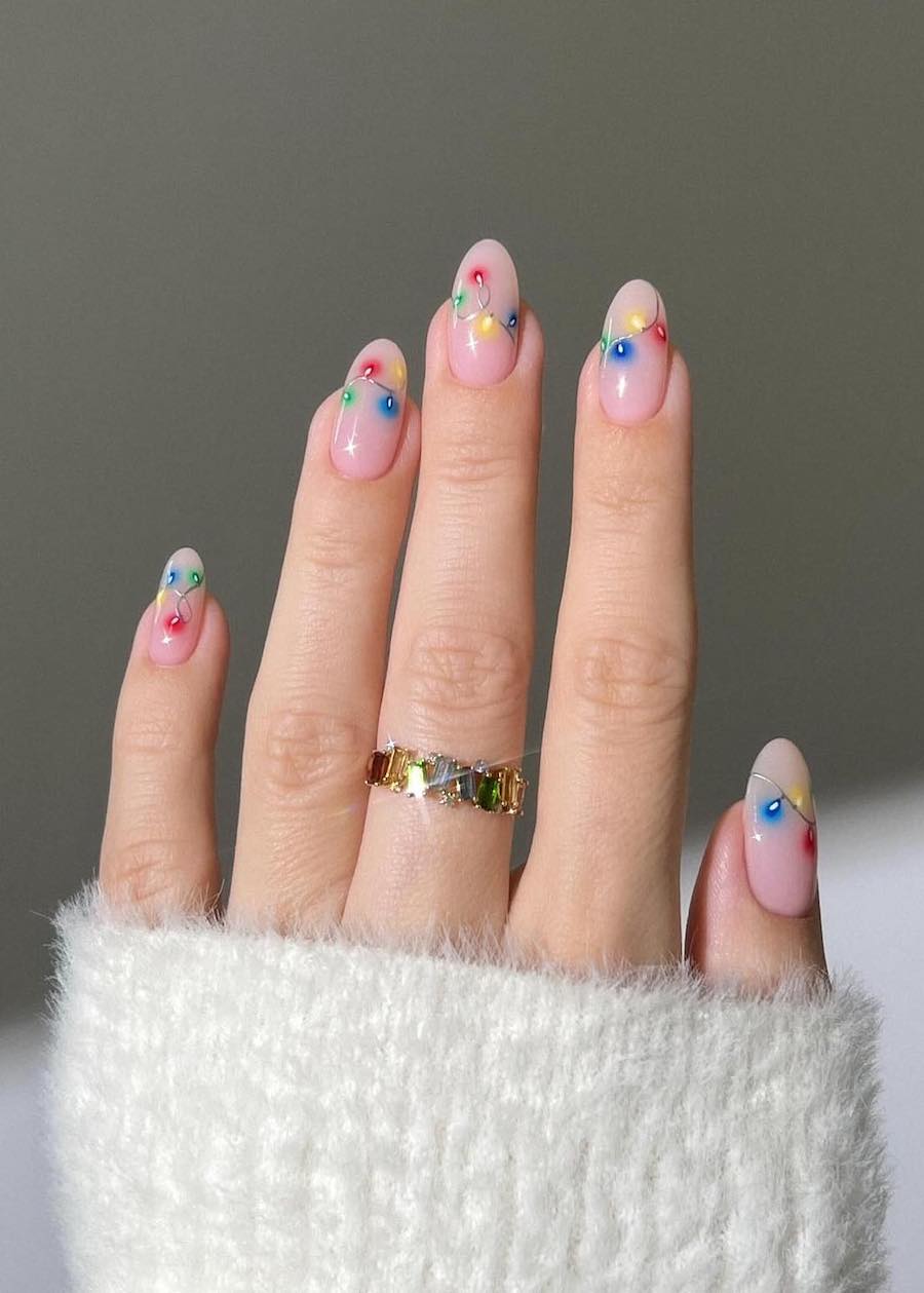 nude pink nails with Christmas light art