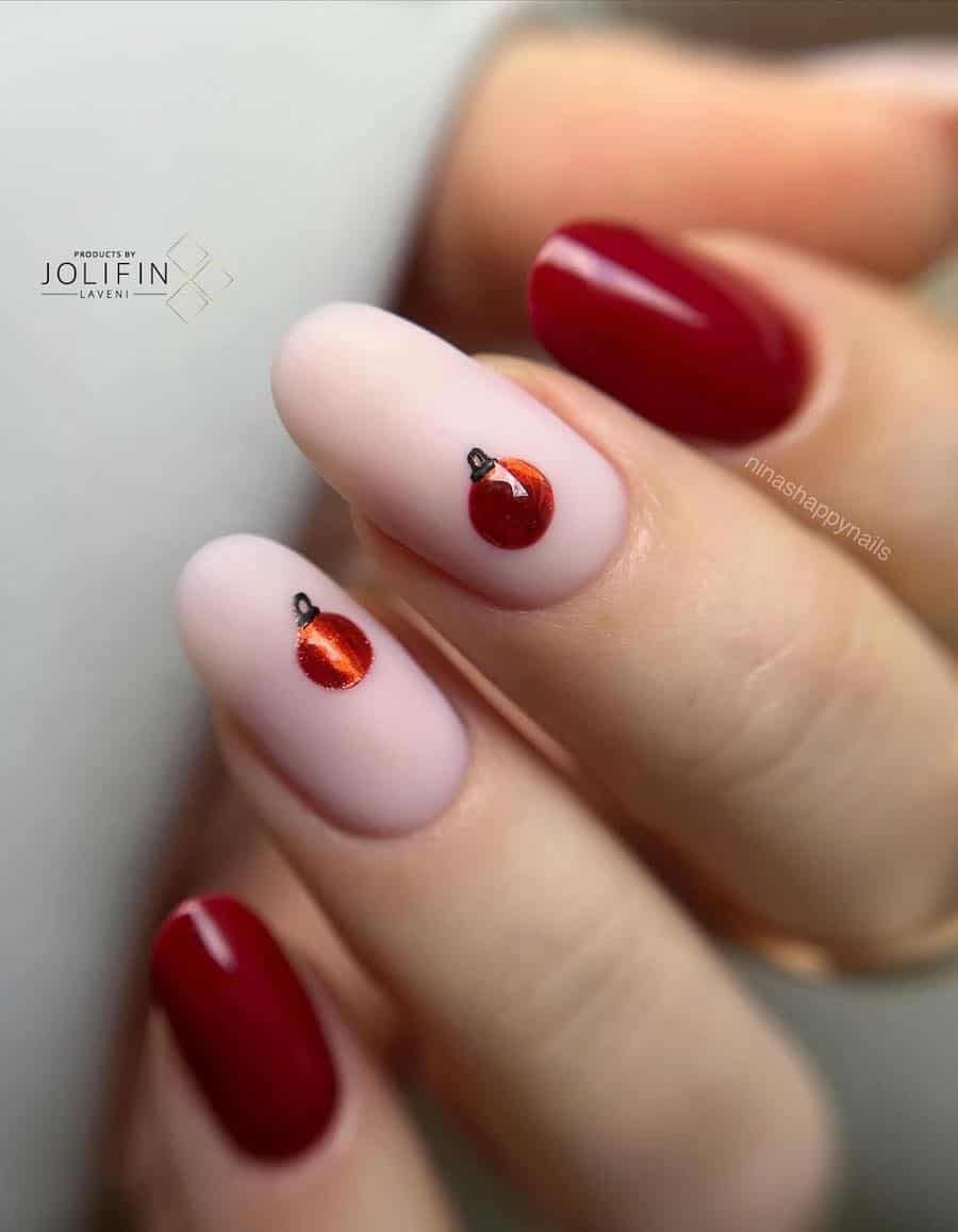 matte pink and red nails with ornament art