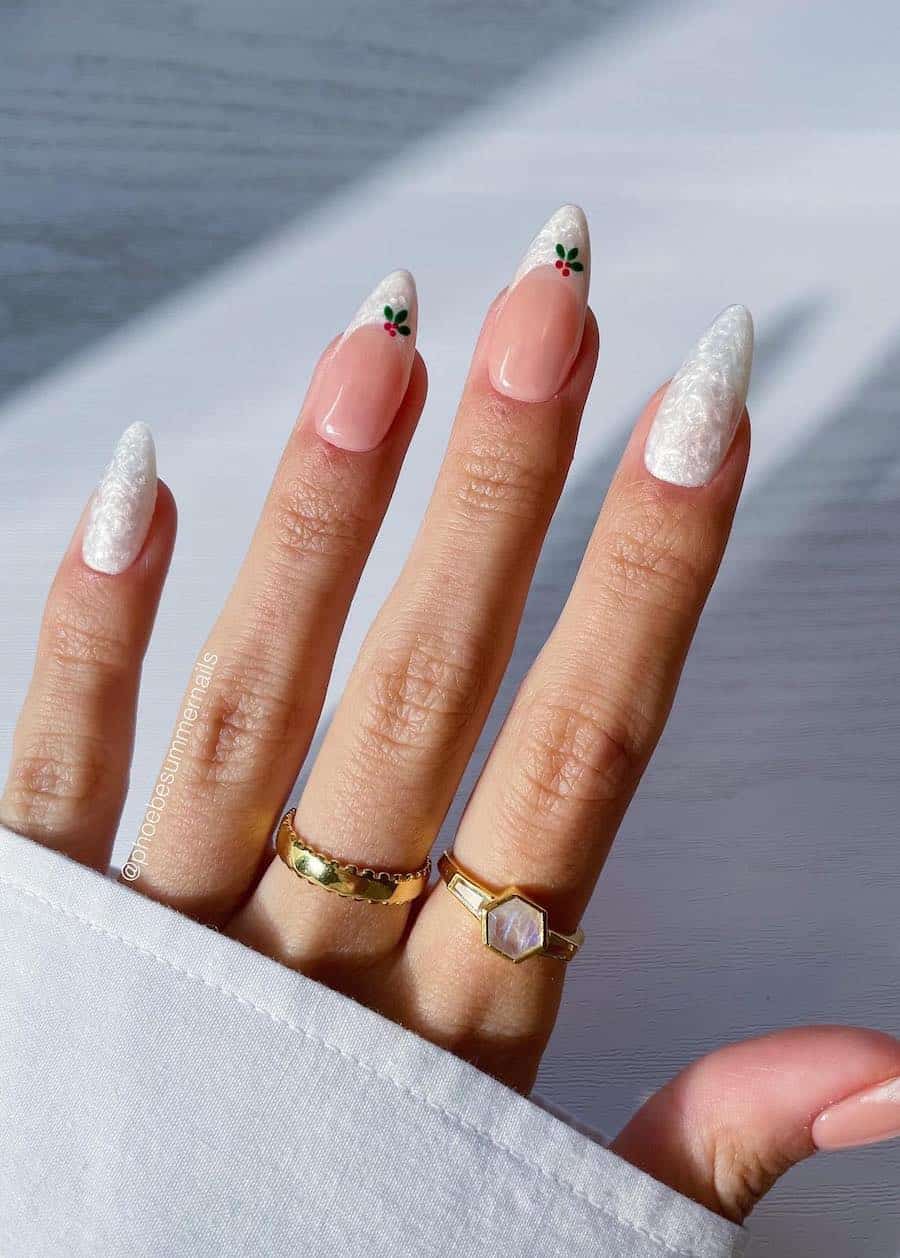 pearly white nails with nude french tip accent nails and mistletoe details