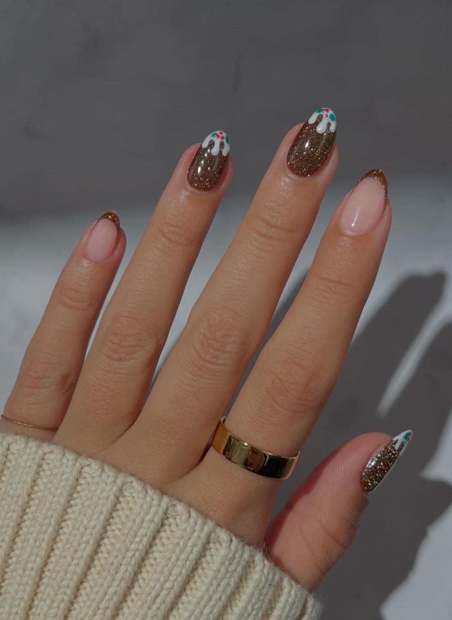 shimmering brown and nude nails with dripping white tips with dots