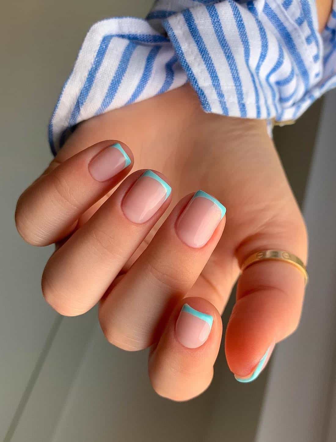 Short nude square nails with tiffany blue tips