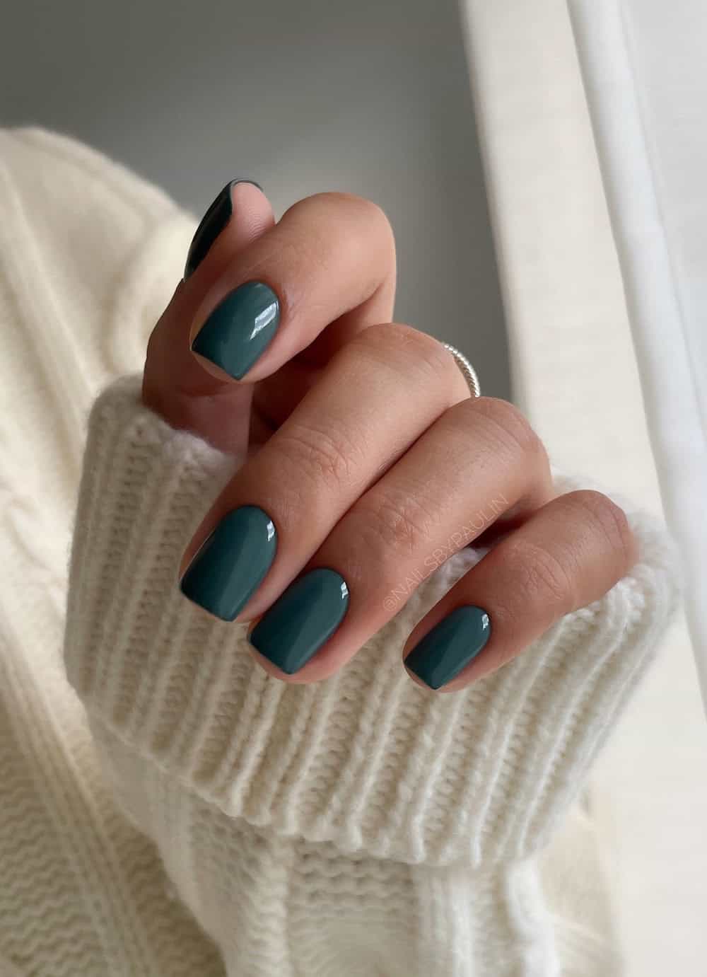 Short dark green nails
