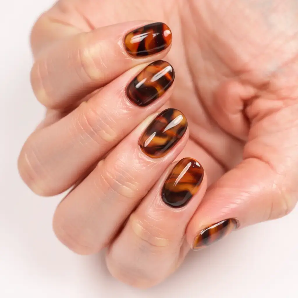 fall tortoiseshell nails 2025 Layered Depth on Short Nails