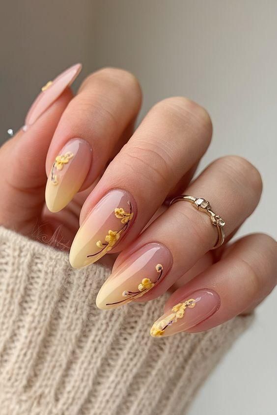 3. Delicate Yellow Blossoms on Soft Ombre Almond Nails