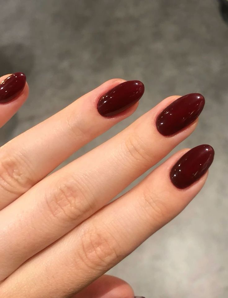10. Effortlessly Chic: Deep Burgundy Almond Nails