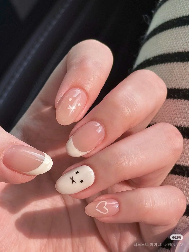 11. Playful Minimalism with French Tips and Cute Art