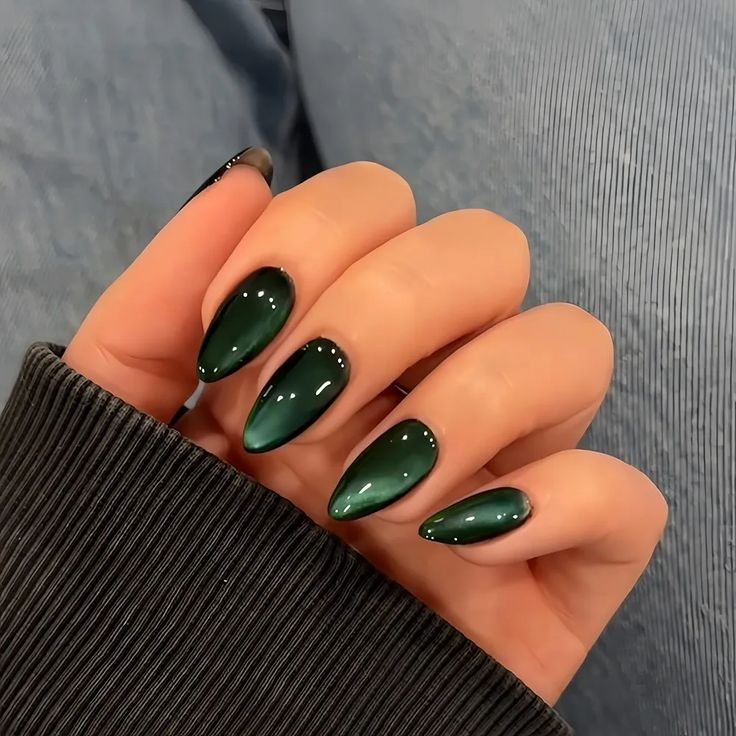 20. Emerald Elegance: A Chic Take on Short Almond Nails