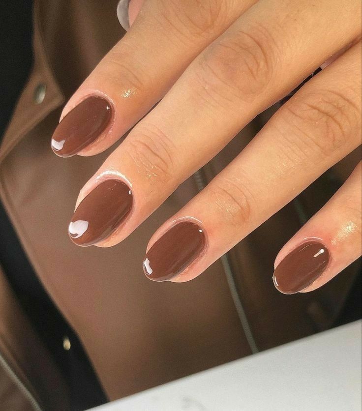 13. Warm Mocha Elegance on Short Almond Nails