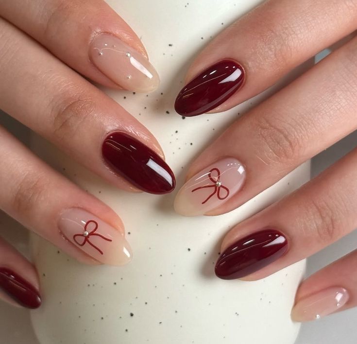 19. Elegant Short Almond Nails with Festive Bow Accents