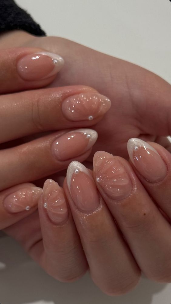 10. Delicate Floral Elegance on Short Almond Nails