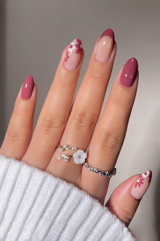20. Charming Pink Almond Nails with Floral Accents for Fall