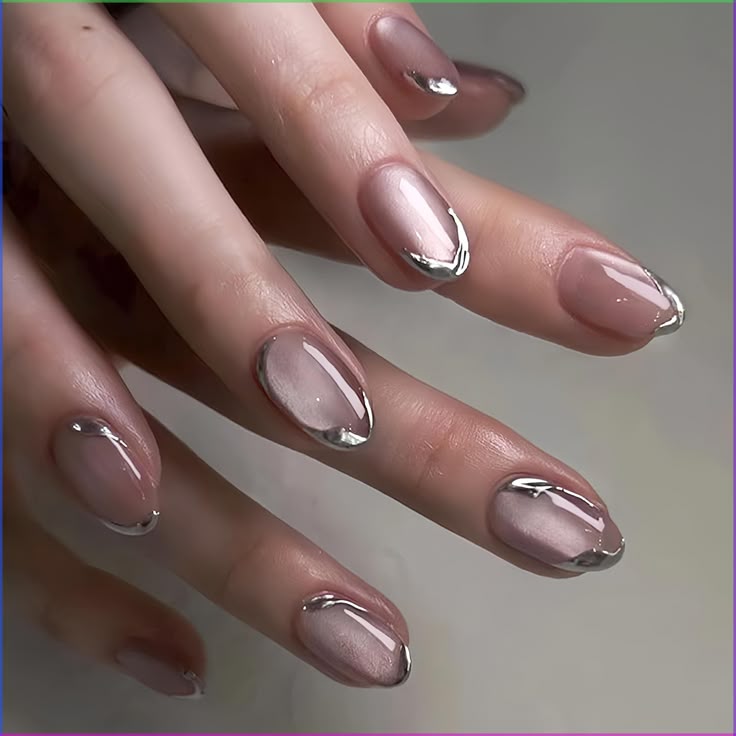 25. Sleek Metallic-Tipped Almond Nails for a Futuristic Flair
